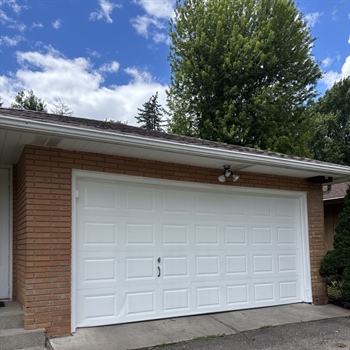 Rusty Garage Door Refinishing Before a Home Sale in Crystal, MN