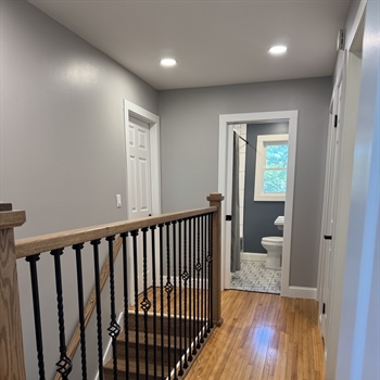 Custom Oak Staircase & Railing Remodel in Minnetonka, MN