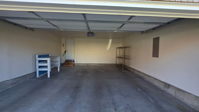Eagan townhouse garage with smooth walls and ceiling painted Sherwin-Williams Pure White